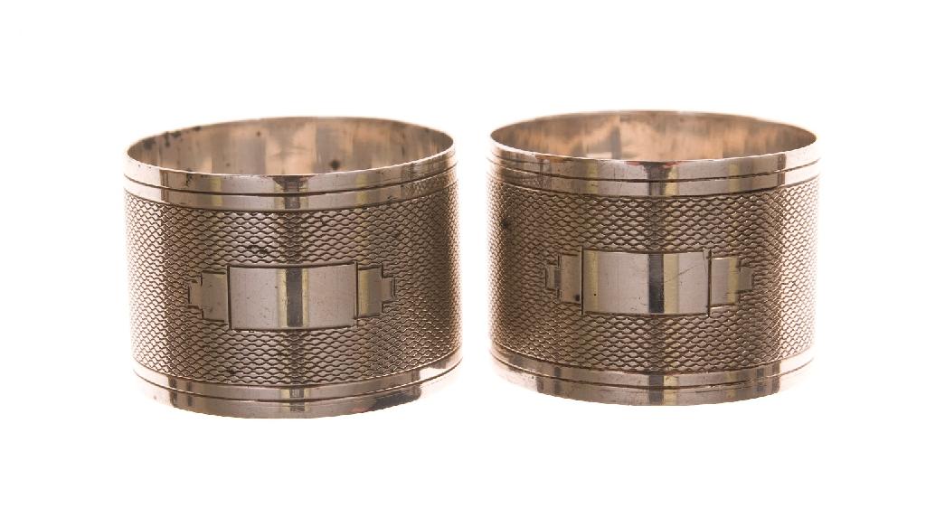 Appraisal: PAIR OF GEORGE VI SILVER NAPKIN RINGS Birmingham in Deco