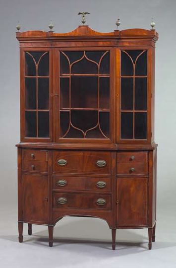 Appraisal: Edwardian Mahogany Bookcase early th century the shaped crest above