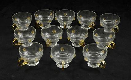 Appraisal: Twelve Clear and Amber Glass Tea Cups in in diam