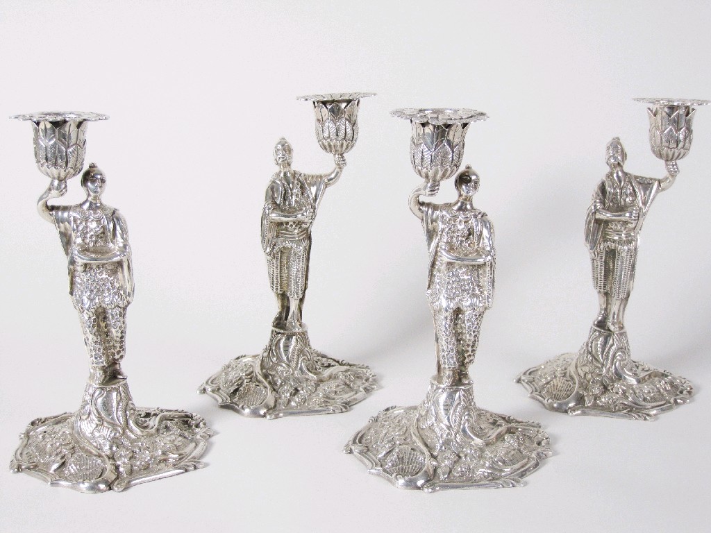 Appraisal: A set of four George III Candlesticks in the form