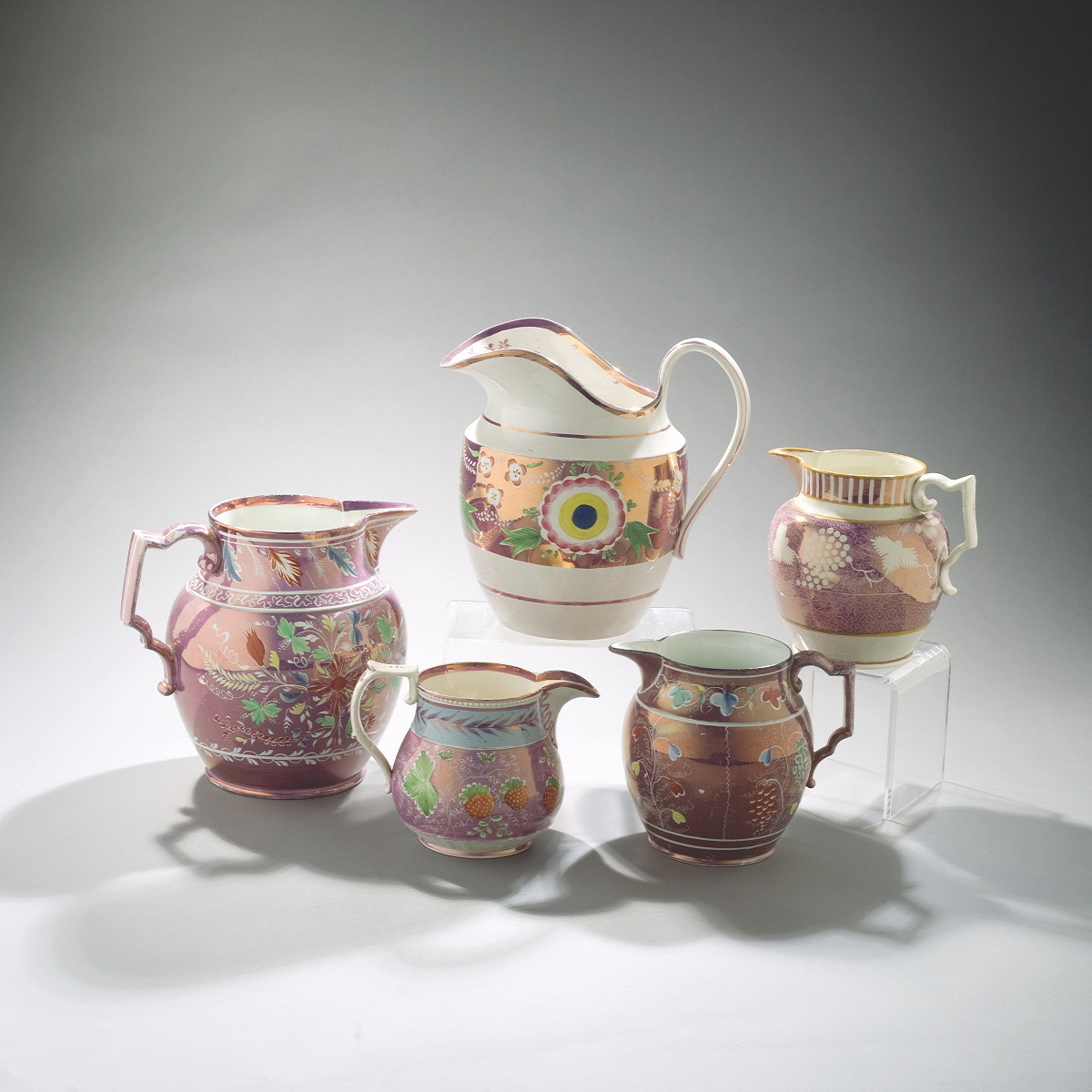 Appraisal: STAFFORDSHIRE ENAMEL-DECORATED AND PINK LUSTRE PITCHER CIRCA - Painted with