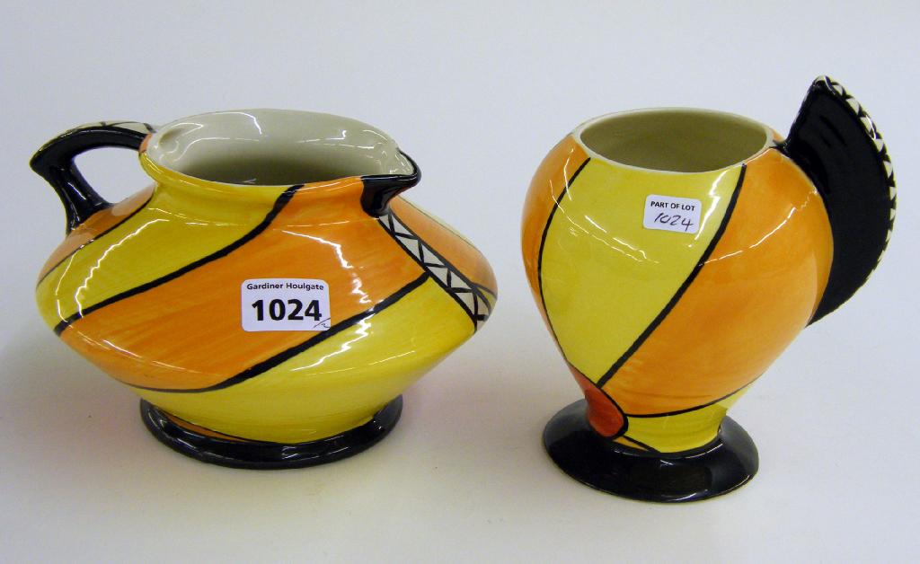 Appraisal: Sunburst' fin handle vase and a similar squat jug each