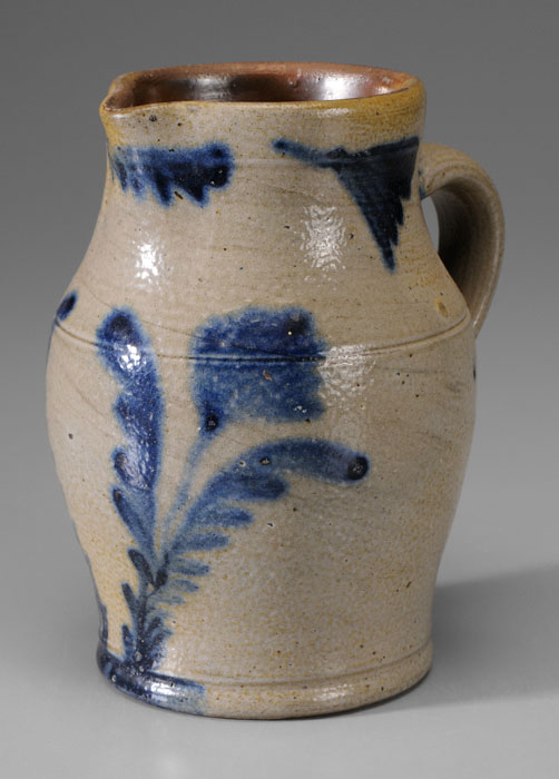 Appraisal: Decorated Stoneware Pitcher American th century blue ferns and flowers