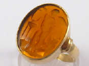 Appraisal: A yellow metal tests carat gold intaglio ring intaglio approx