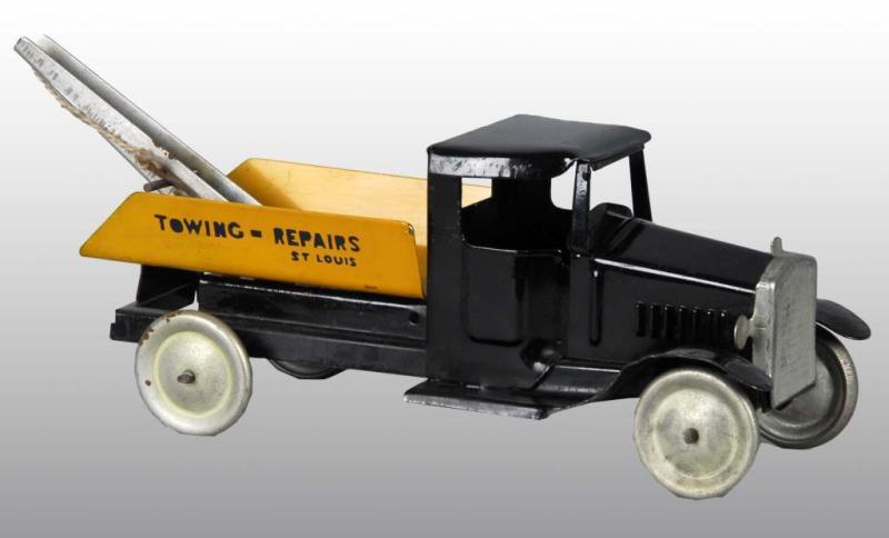 Appraisal: Pressed Steel Metalcraft Towing-Repairs Truck Toy Description American Very early