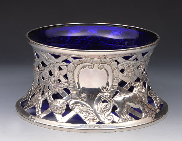 Appraisal: AN IRISH SILVER DISH RING with pierced sides decorated with