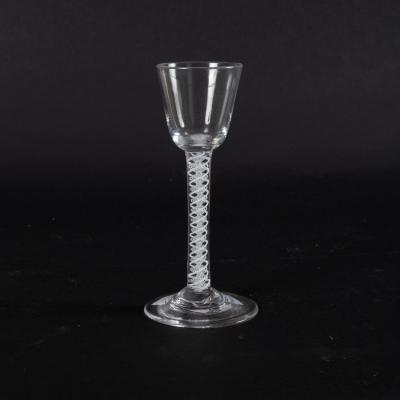 Appraisal: An th Century cordial glass on a cotton twist stem