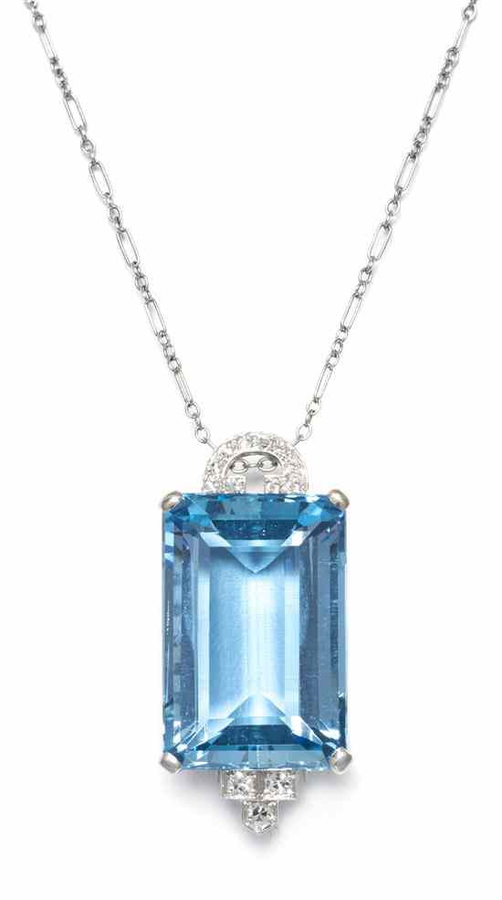 Appraisal: A Platinum Aquamarine and Diamond Pendant Brooch containing an octagonal