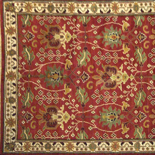 Appraisal: WILLIAM MORRIS STYLE Rug with olive green and ochre vinescroll