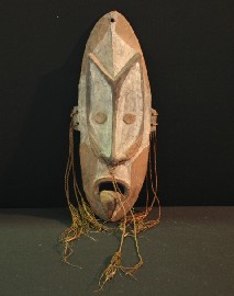 Appraisal: A New Guinean Mask with string together with another carved