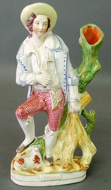 Appraisal: Staffordshire figural group spill vase of a farmer with a