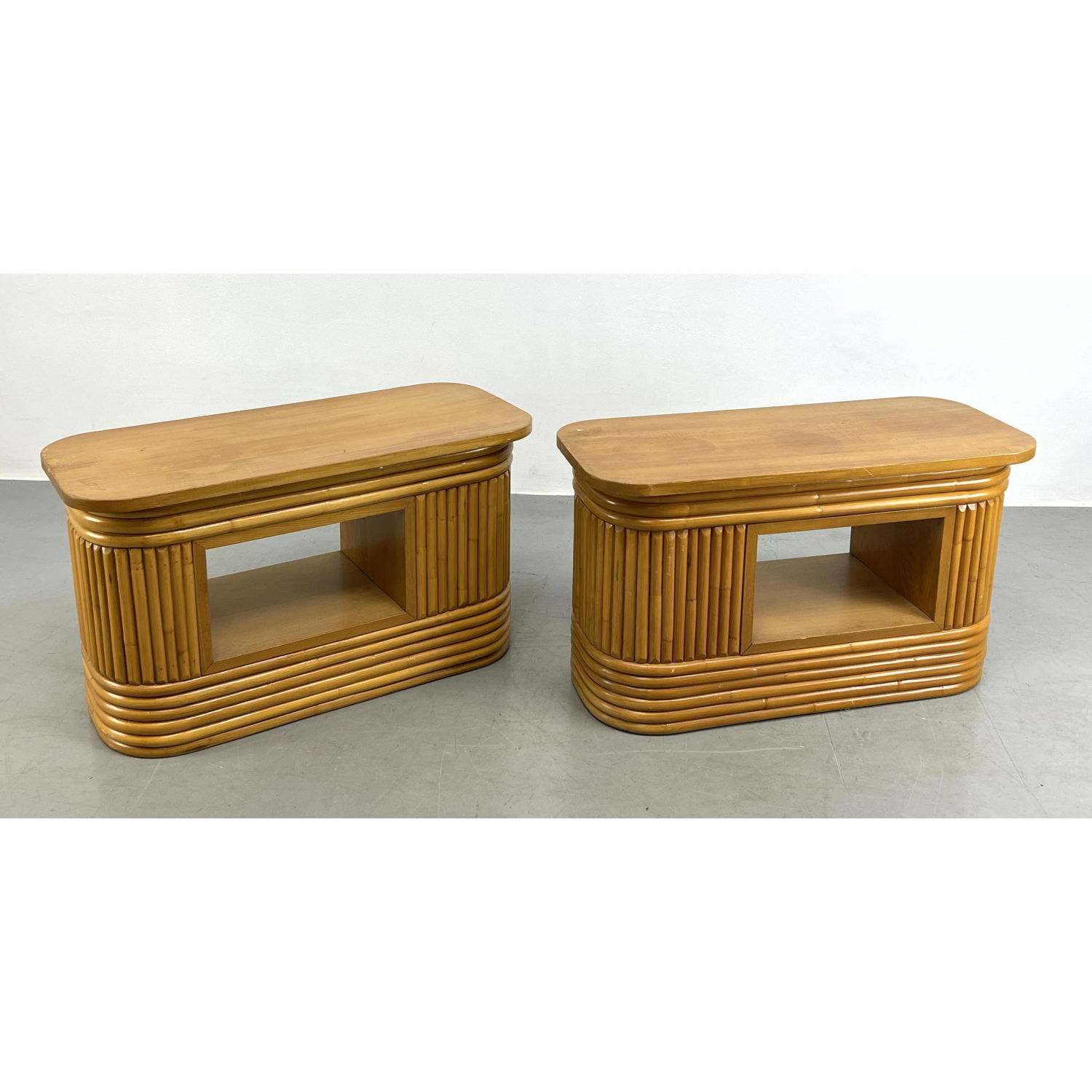 Appraisal: Pr Paul Frankl style Rattan Side Tables Rounded rattan sides