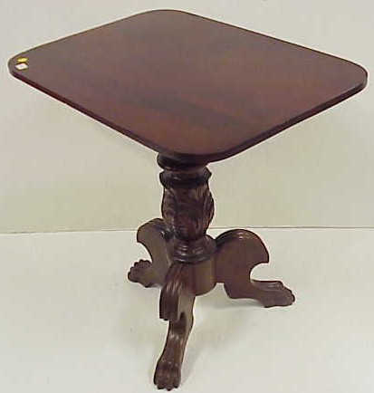 Appraisal: Empire candlestand mahogany oblong top with rounded corners heavy standard