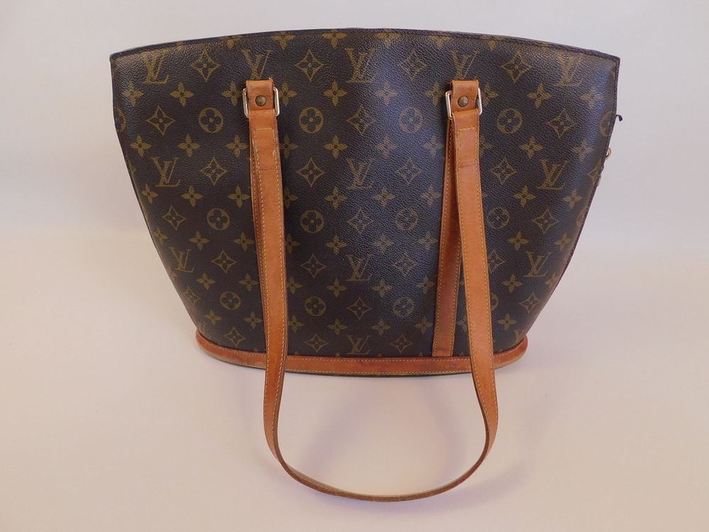 Appraisal: LOUIS VUITTON LOGO TOTE Old Louis Vuitton logo tote light