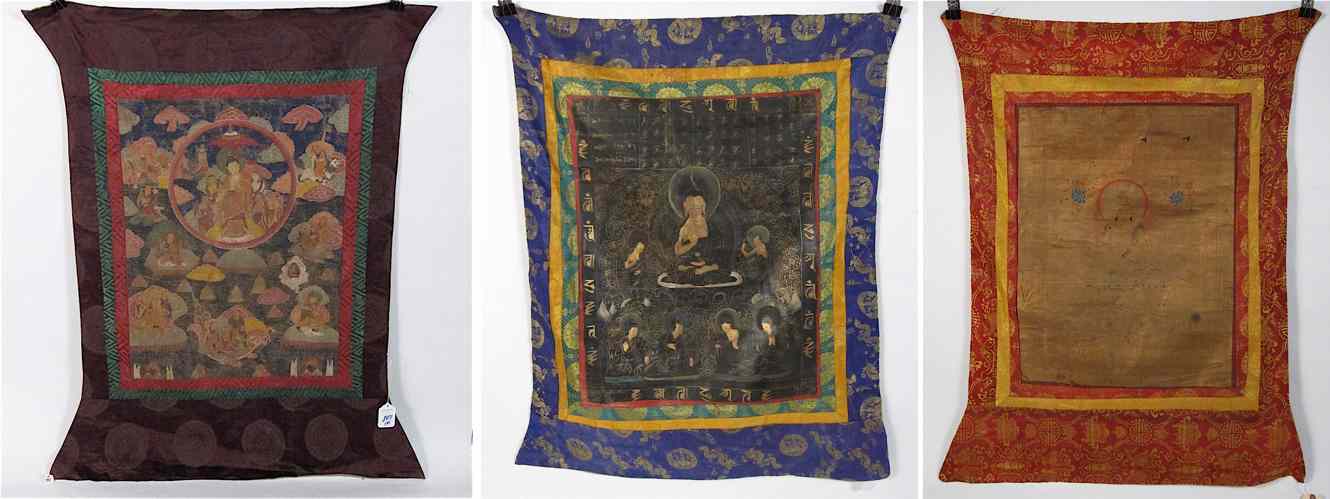 Appraisal: THREE TIBETAN TANKA paintings on silk the first with Buddha