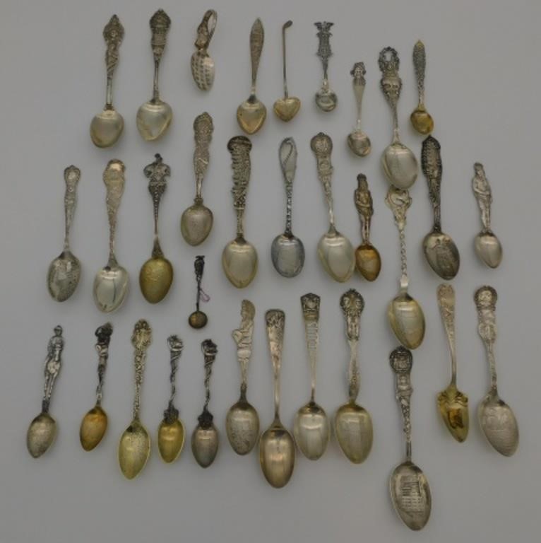 Appraisal: two spoons with the figure of a Native American man