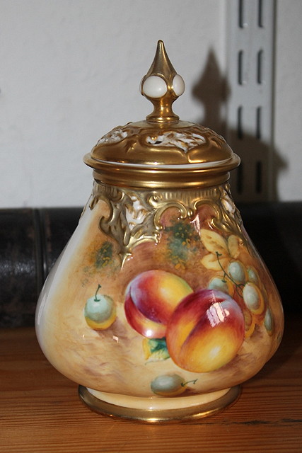 Appraisal: A ROYAL WORCESTER PORCELAIN VASE and cover painted with fruit