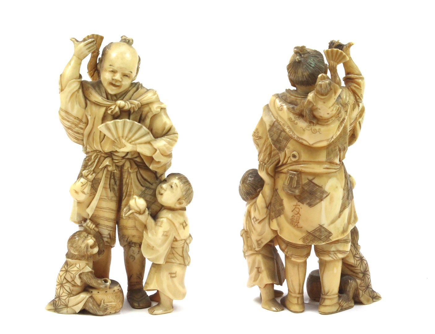 Appraisal: A Japanese ivory okimono of a monkey trainer Meiji period