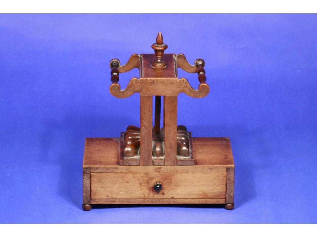 Appraisal: A REGENCY MAHOGANY MINIATURE BOOK PRESS the superstructure with a