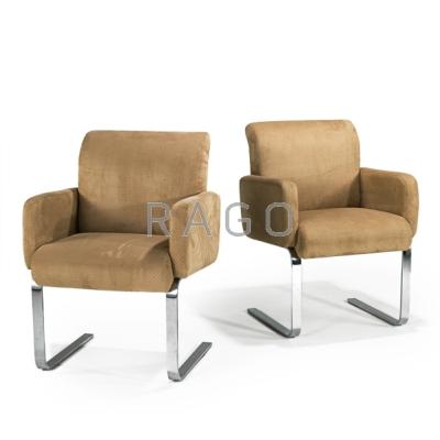 Appraisal: s Pair of cantilevered armchairs Chromed steel and ultra-suede Unmarked