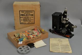 Appraisal: Lindstrom mm projector with four films Mickey Mouse two Popeye