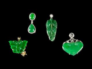 Appraisal: Four Small Jadeite Pendants Four Small Jadeite Pendants the first