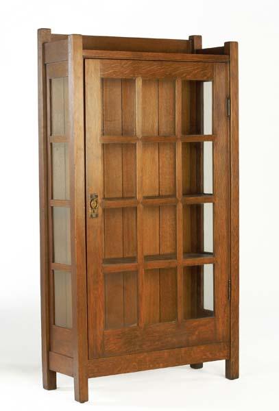 Appraisal: GUSTAV STICKLEY Early single-door china cabinet with mitered mullions and