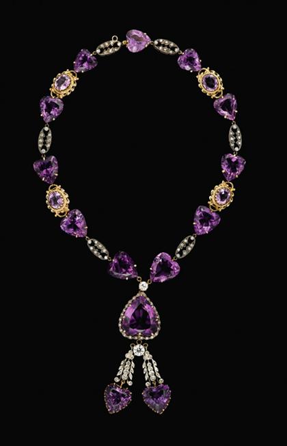 Appraisal: karat yellow gold amethyst and diamond necklace Heart and oval