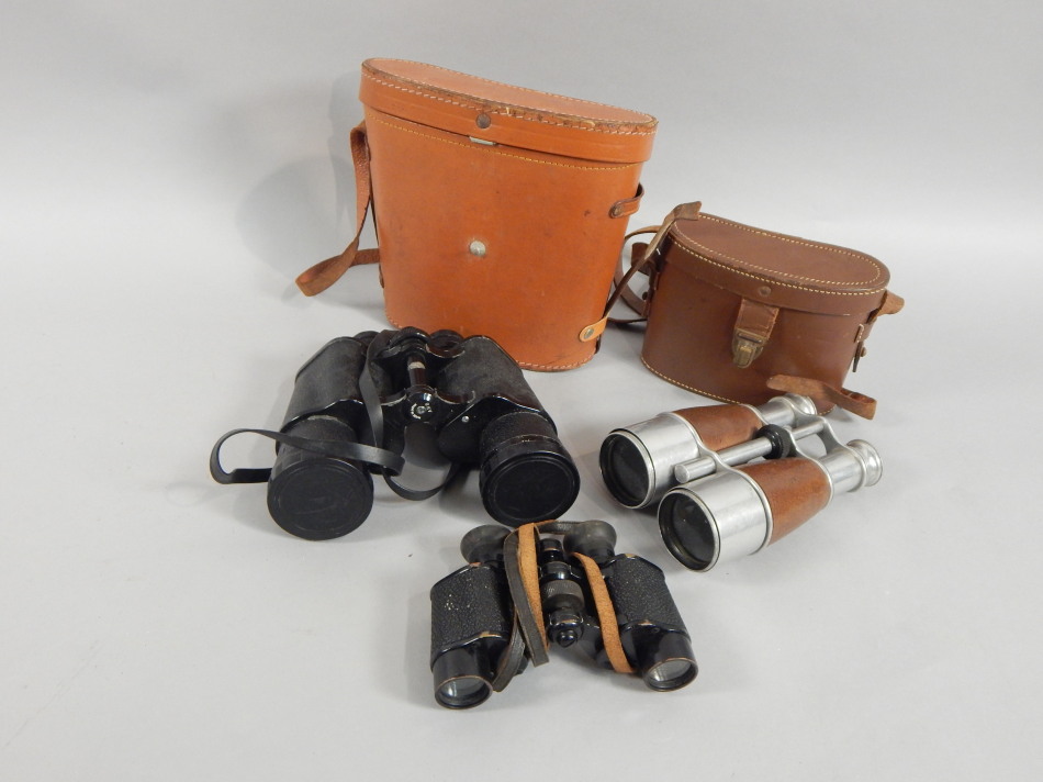 Appraisal: Three pairs of binoculars to include an aluminium and leather