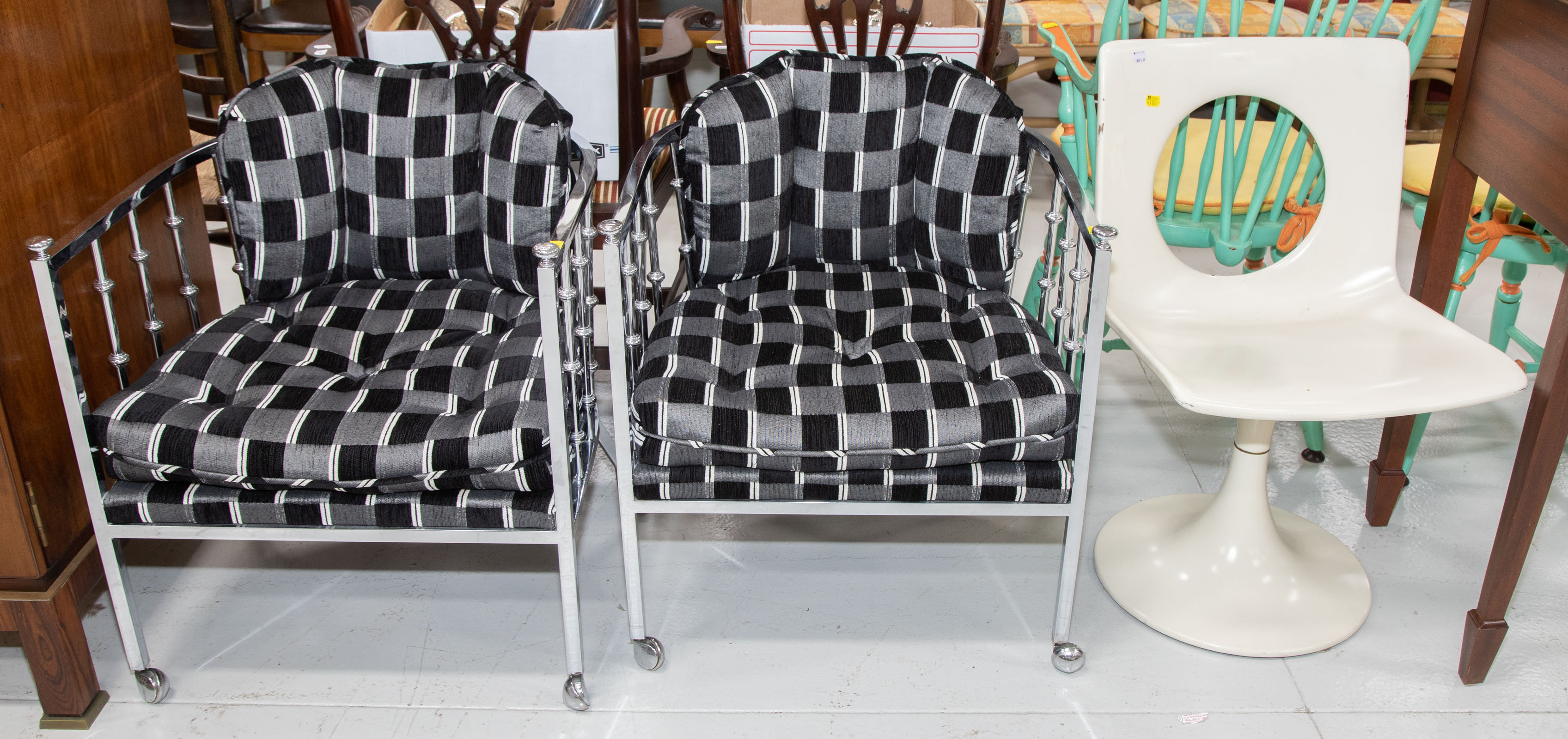 Appraisal: THREE MODERN STYLE CHAIRS Comprising a pair of chrome framed