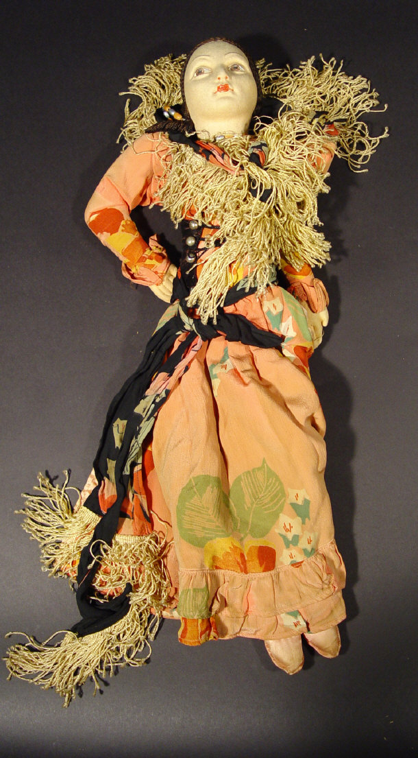 Appraisal: Norah Wellings Spanish dancer doll with painted felt face and