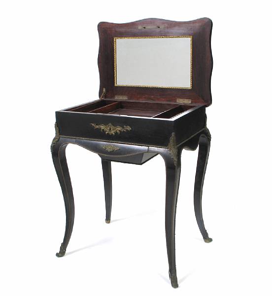 Appraisal: A Napoleon III gilt metal mounted ebonized work table third