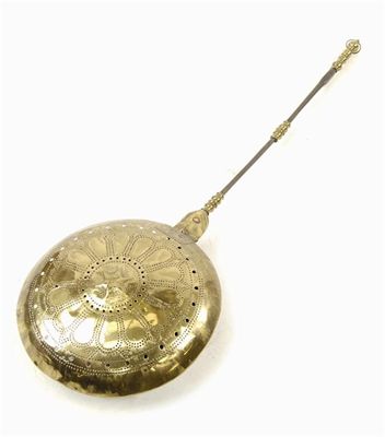 Appraisal: A Dutch brass warming pan the part turned handle to