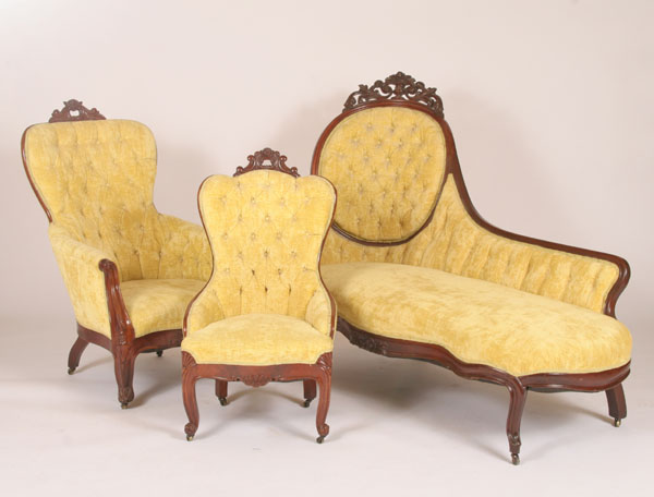 Appraisal: Three piece Victorian parlor set gentleman and ladies' upholstered arm