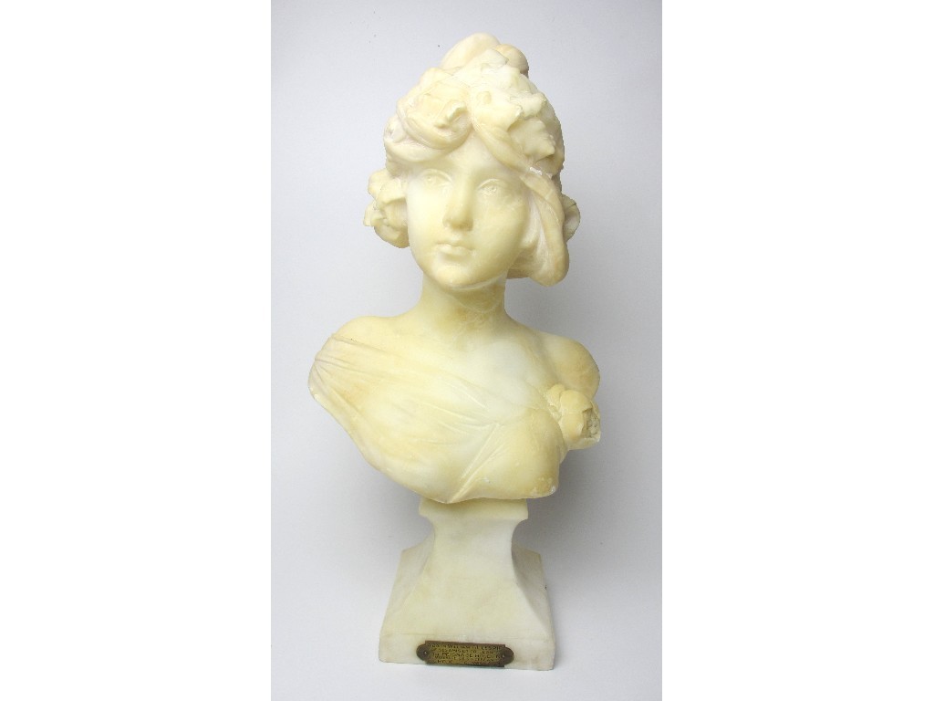 Appraisal: A French alabaster bust carved as a young woman on