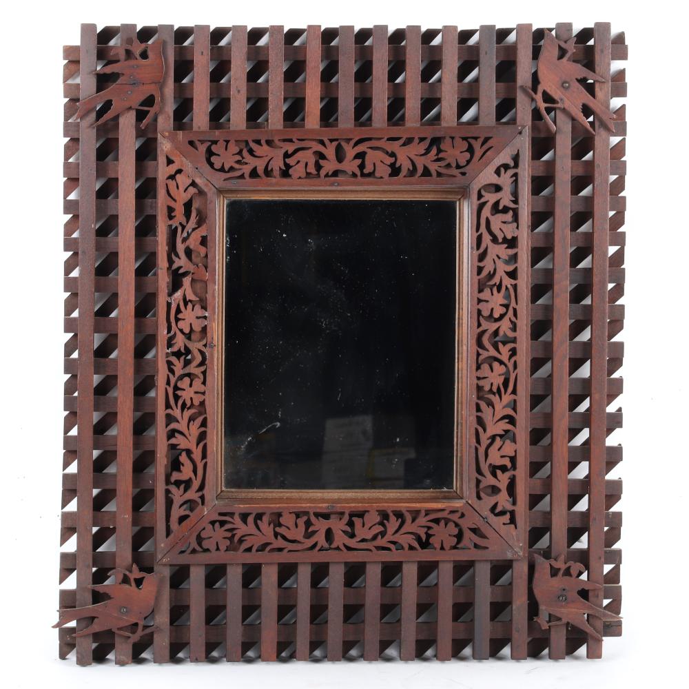 Appraisal: TRAMP ART MIRROR WITH DEEPLY CARVED AND LAYERED LATTICEWORK CARVED