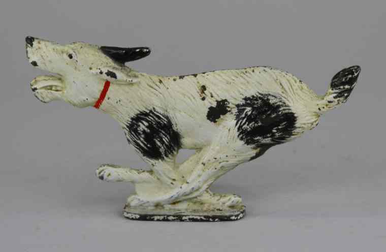 Appraisal: RUNNING WIREHAIRED FOX TERRIER DOORSTOP ''Spencer Guilford Conn '' wedge