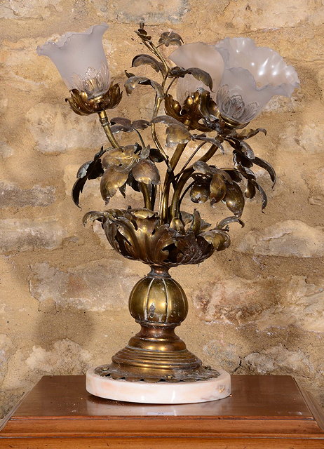 Appraisal: A PRESSED BRASS THREE LIGHT TABLE LAMP of foliate form