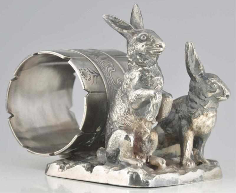 Appraisal: Double Rabbits Figural Napkin Ring By Pairpoint Mfg Co Condition