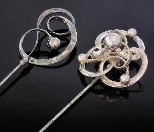 Appraisal: A pair of Charles Horner silver hat pins ins steel