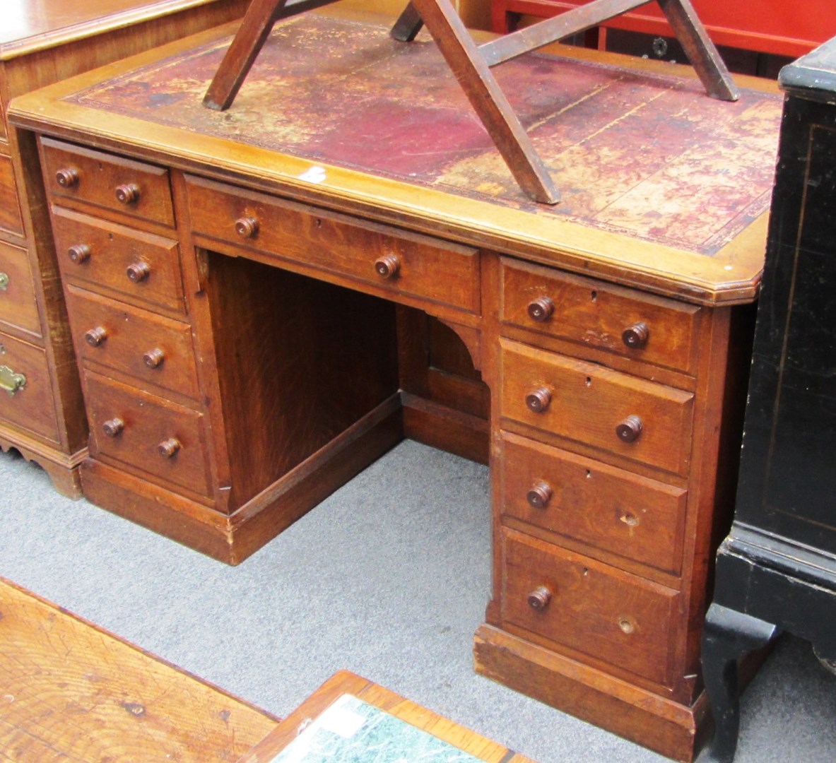 Appraisal: A th century oak pedestal desk the canted top over