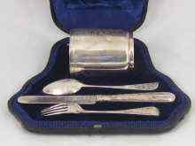 Appraisal: An early Victorian silver Christening set comprising mug knife fork