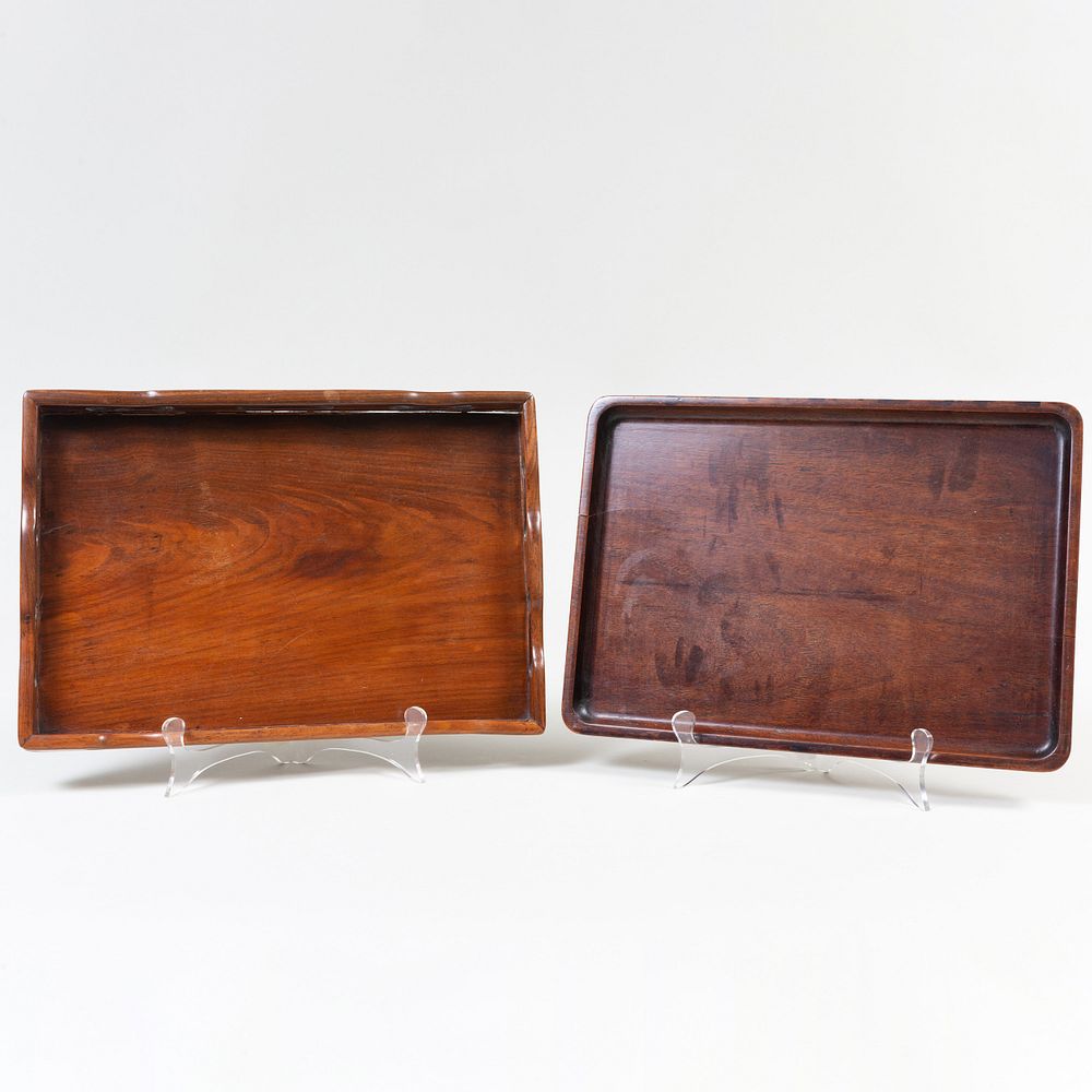 Appraisal: Two Chinese Carved Hardwood Trays The larger x in the