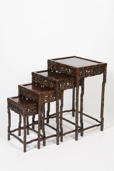 Appraisal: A NEST OF FOUR CHINESE HARDWOOD OCCASIONAL TABLES each with