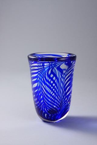 Appraisal: Cased glass vase with internal blue design Signed and numbered