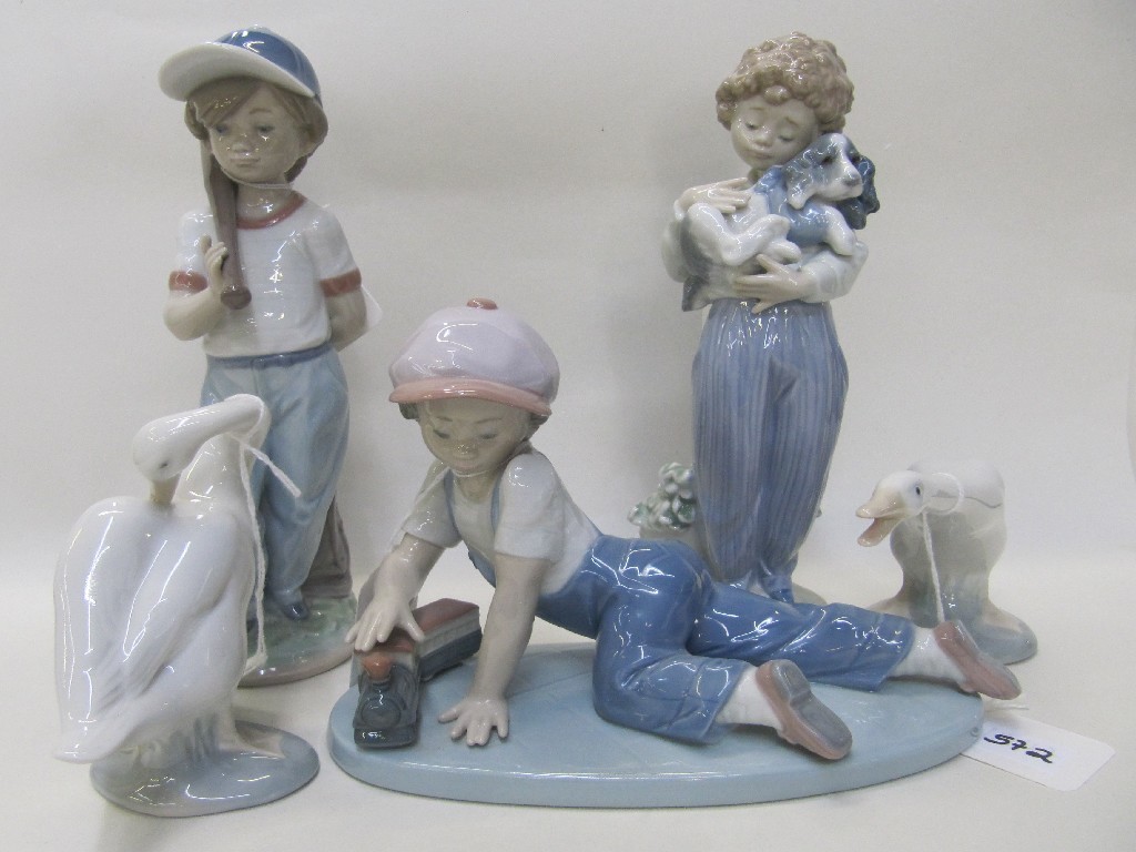 Appraisal: Three Lladro figures of children one signed in pen and