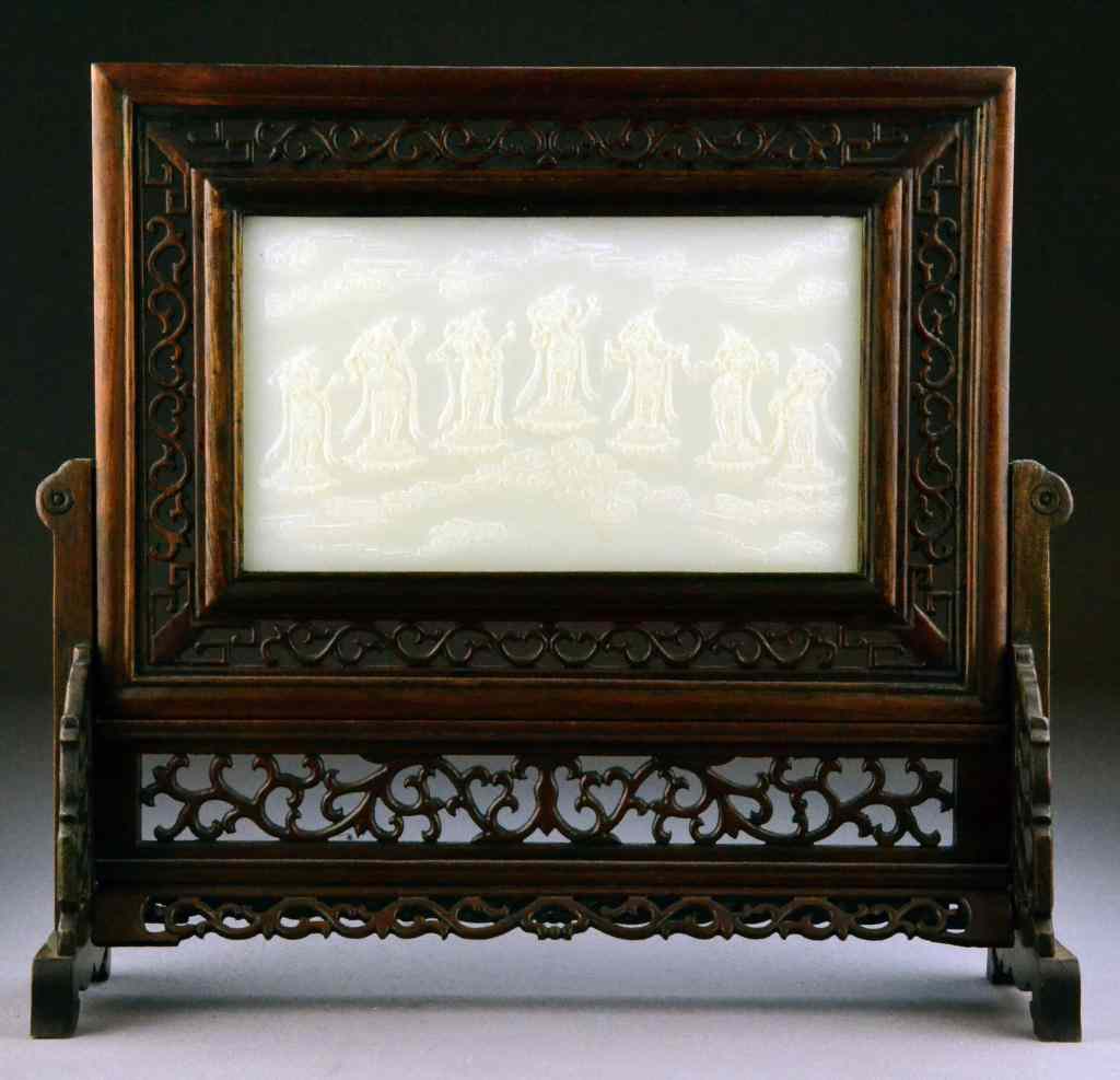 Appraisal: Chinese Jade Plaque Set In Wood StandThe white jade plaque