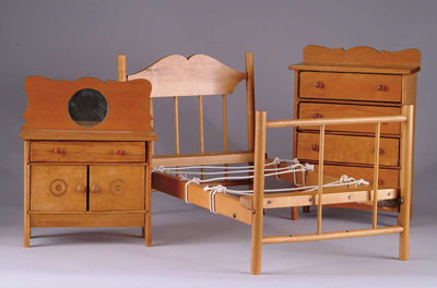 Appraisal: THREE-PIECE DOLL BEDROOM SET Consisting of bed dresser with four