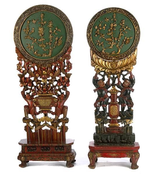 Appraisal: A pair of Chinese polychrome carved wood altar pieces height