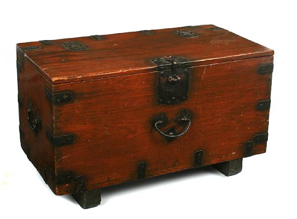 Appraisal: A Korean mixed wood storage chest with wrought iron mounts